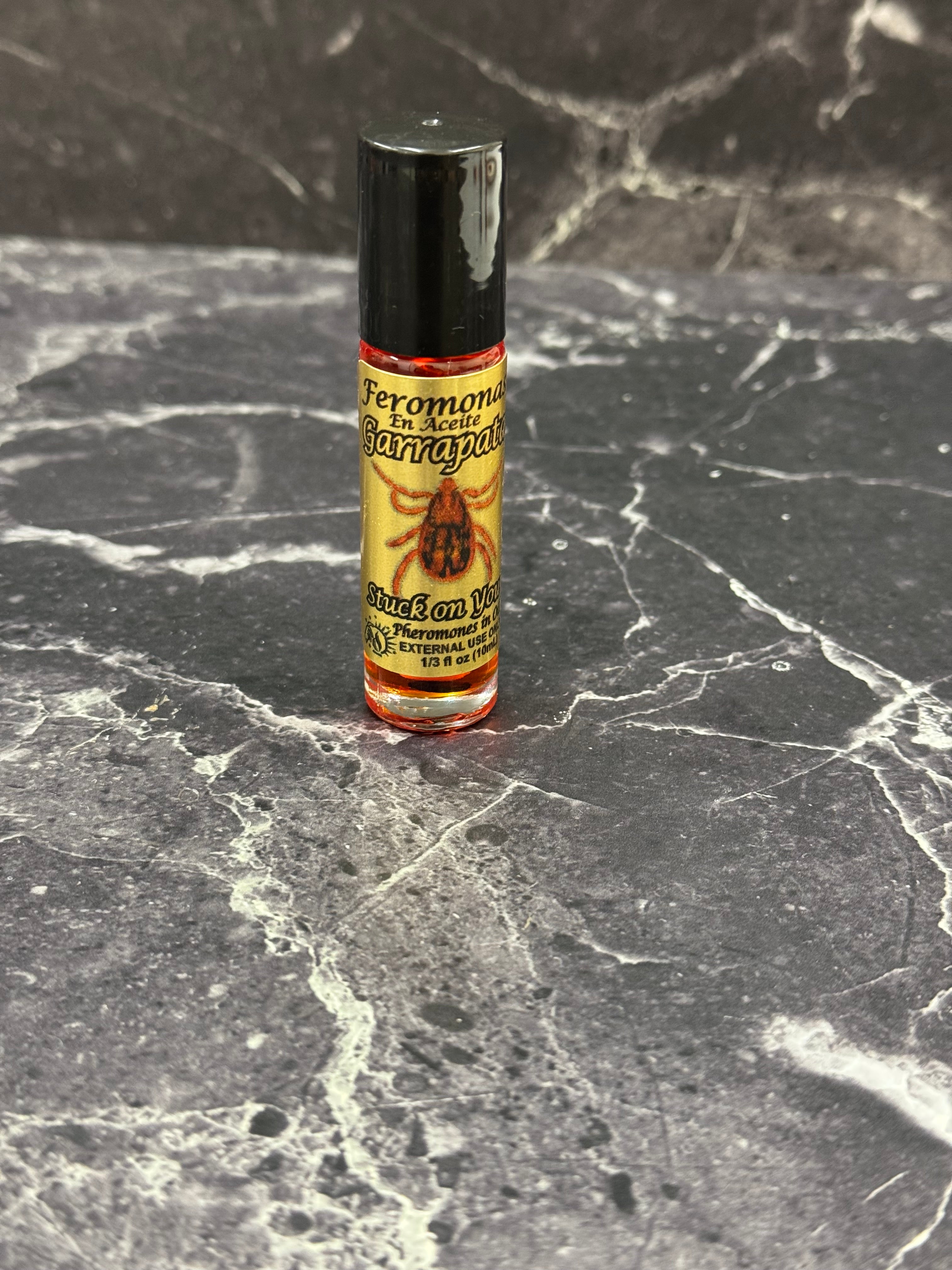 Feromona en Aceite Garrapata “Stuck on You” Roll-On 🧡✨