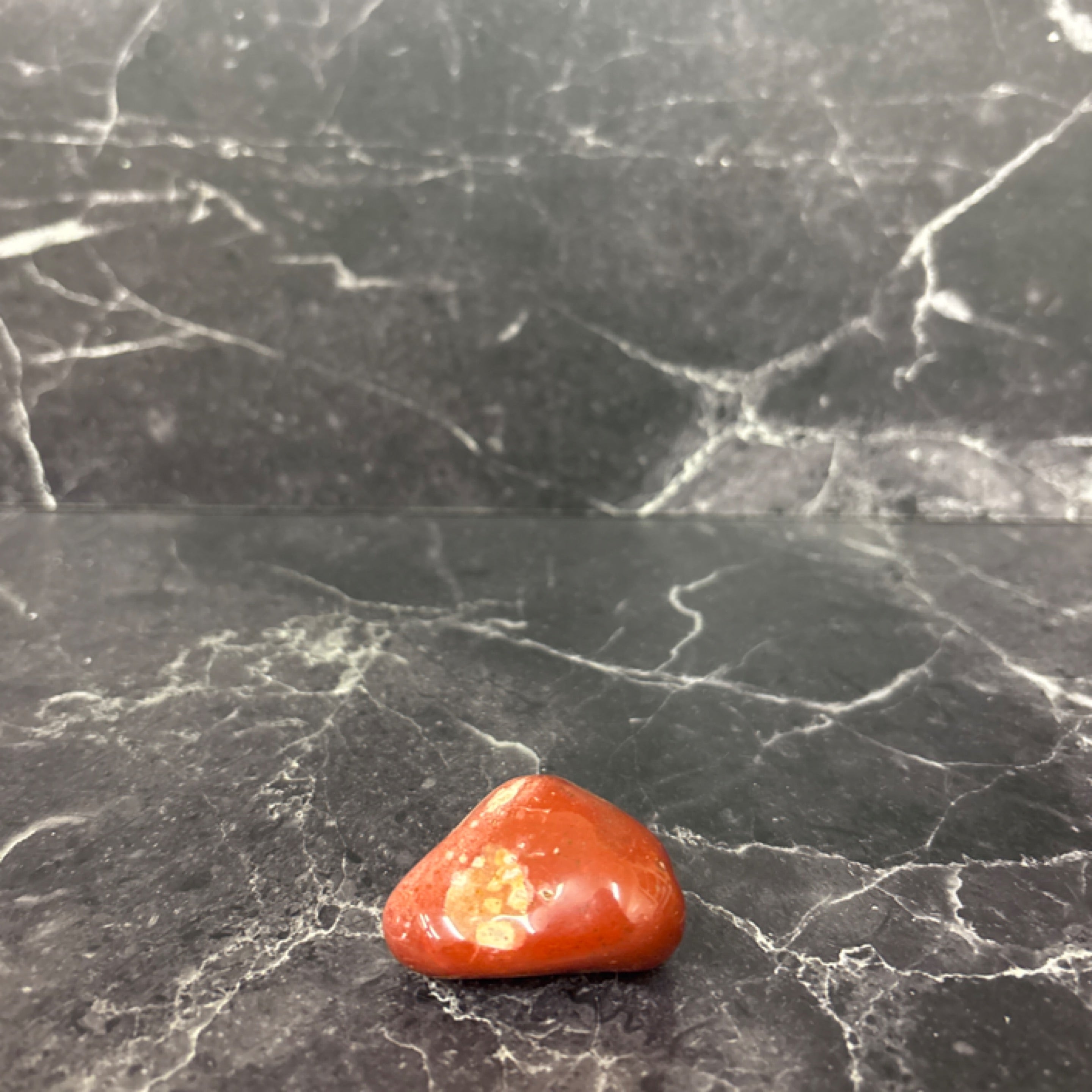 ❤️ Red Jasper Crystal on Black Marble