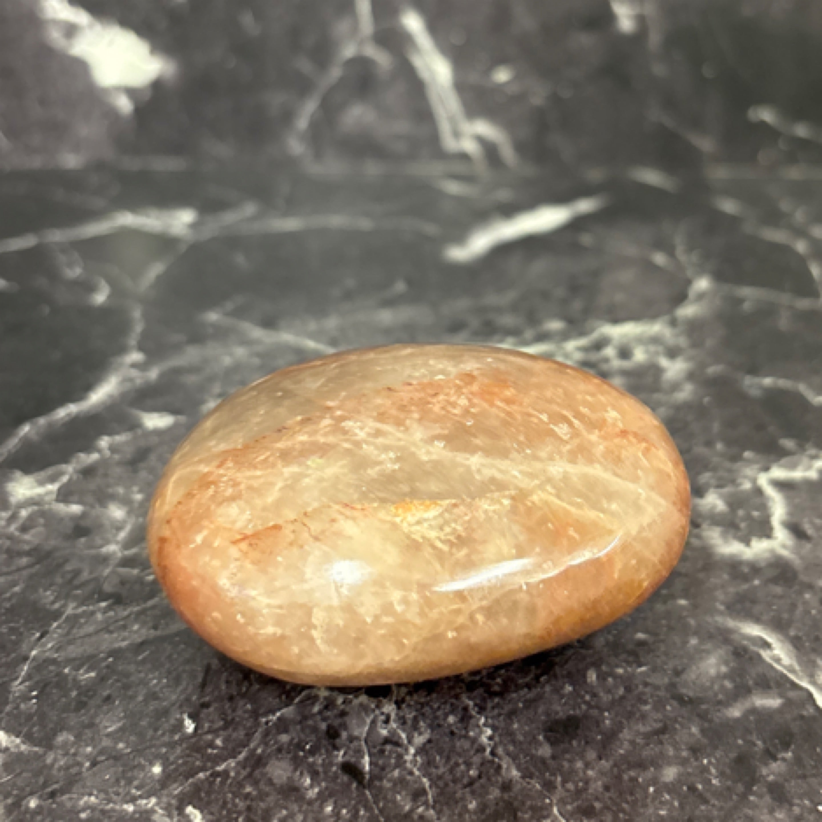 ☀️Peach moon Stone Palm on Black Marble
